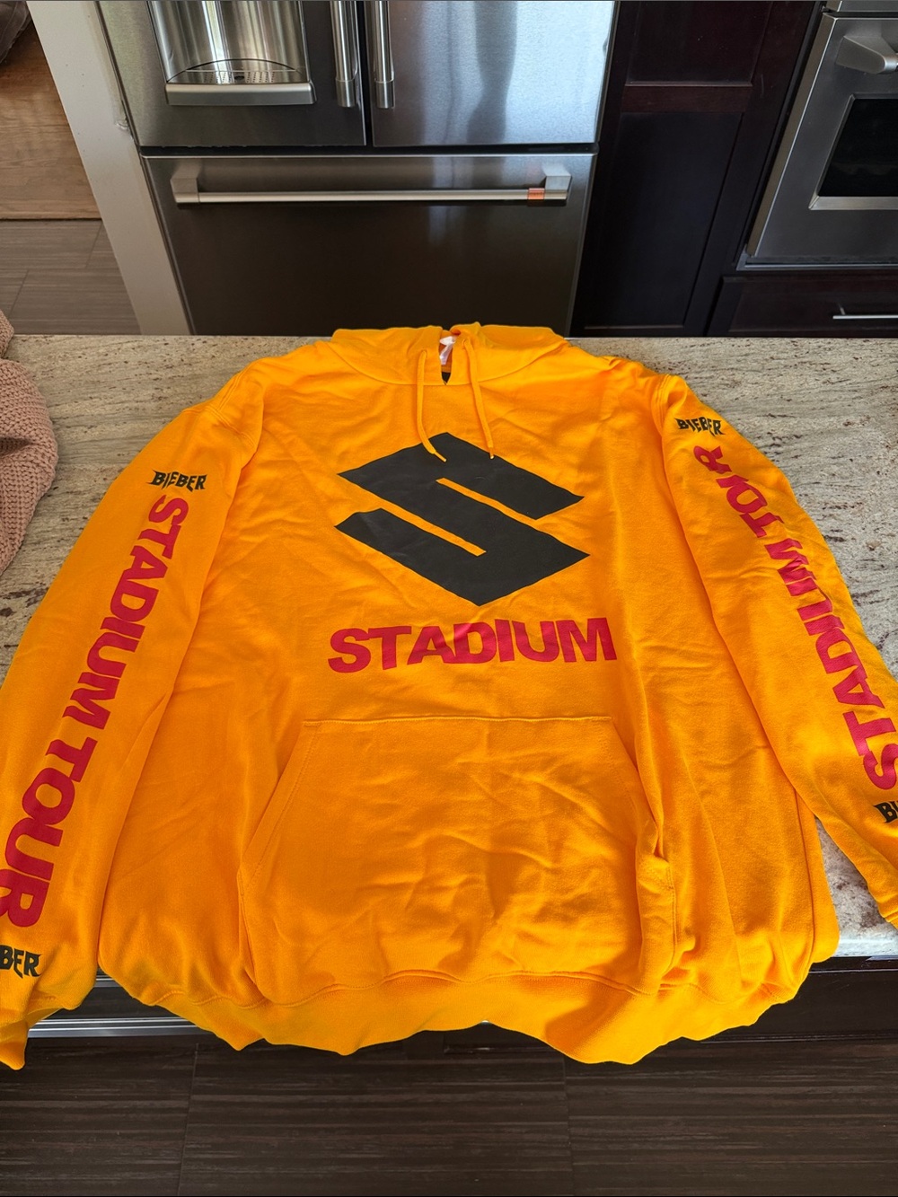 Justin Bieber Yellow & Black Stadium Tour Hoodie with Red Sleeve Graphics